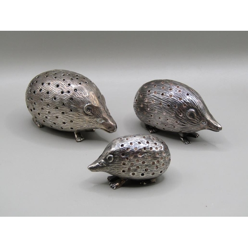 126 - Three silver hedgehog pin cushions, Birmingham 1903, 1904 & 1905, 7cm, 6cm & 4.5cm w.