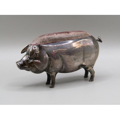 127 - A silver pig pin cushion, Birmingham 1904, 7cm l.