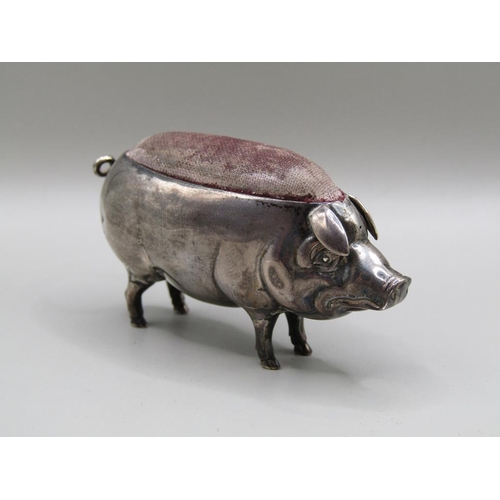 127 - A silver pig pin cushion, Birmingham 1904, 7cm l.