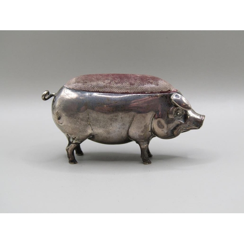 127 - A silver pig pin cushion, Birmingham 1904, 7cm l.