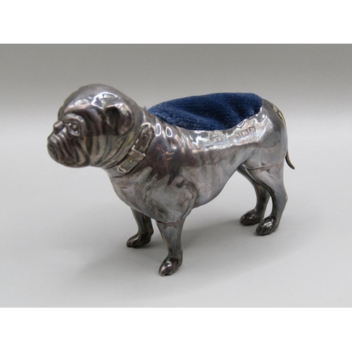 128 - A silver bulldog pin cushion, Birmingham 1914, 7.5cm l.