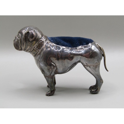 128 - A silver bulldog pin cushion, Birmingham 1914, 7.5cm l.