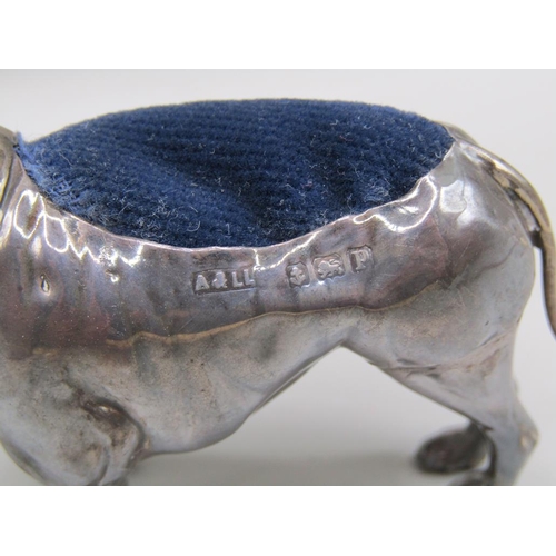 128 - A silver bulldog pin cushion, Birmingham 1914, 7.5cm l.