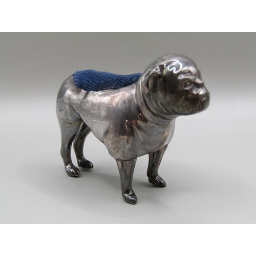 128 - A silver bulldog pin cushion, Birmingham 1914, 7.5cm l.