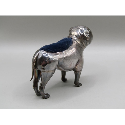 128 - A silver bulldog pin cushion, Birmingham 1914, 7.5cm l.