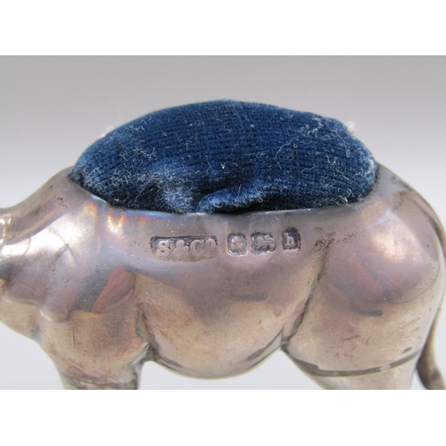 129 - A silver camel pin cushion, Birmingham 1907, 7.5cm l.