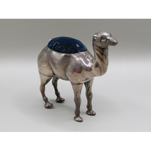 129 - A silver camel pin cushion, Birmingham 1907, 7.5cm l.