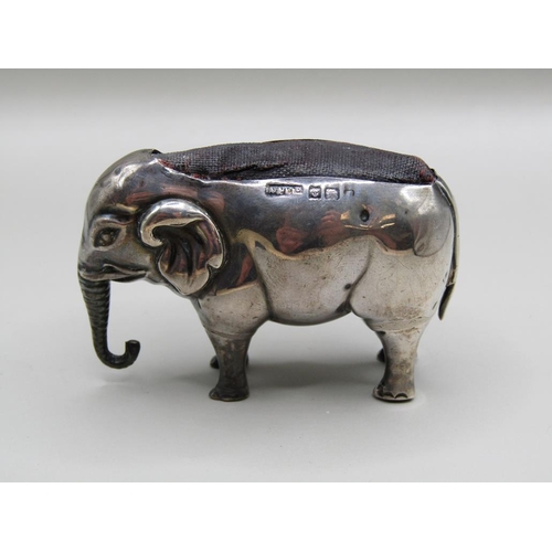 130 - A silver elephant pin cushion, Birmingham 1910, 7cm l.