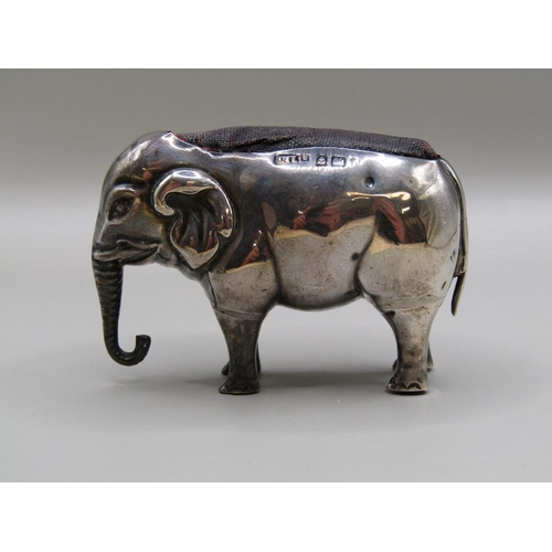 130 - A silver elephant pin cushion, Birmingham 1910, 7cm l.