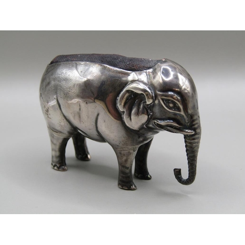 130 - A silver elephant pin cushion, Birmingham 1910, 7cm l.