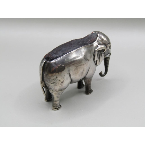 130 - A silver elephant pin cushion, Birmingham 1910, 7cm l.