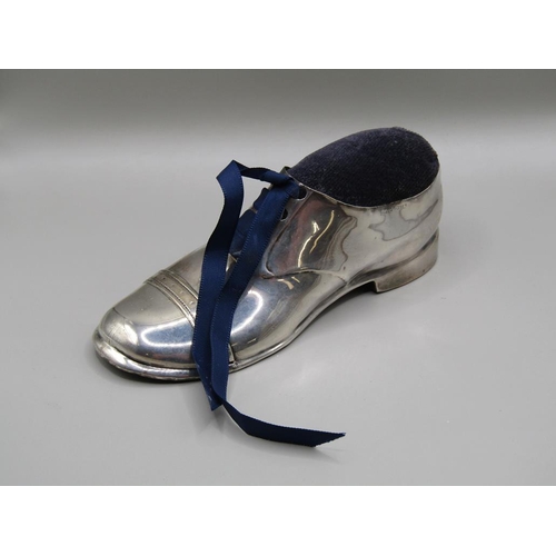 133 - A silver shoe pin cushion, Chester 1909, 13cm l.