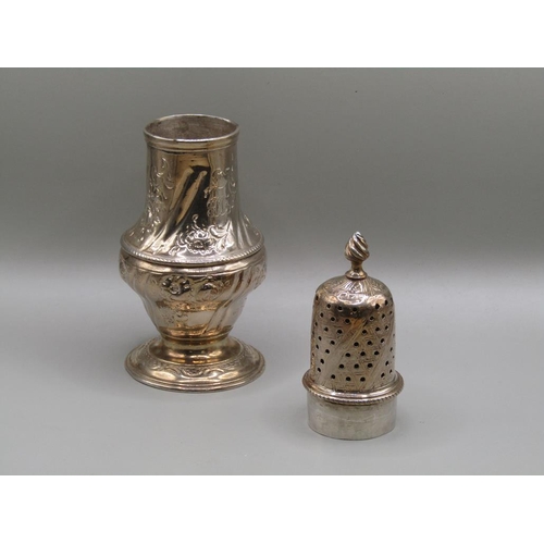 146 - A George III silver pepper with a pierced dome cover and flame finial, having an embossed and chased... 