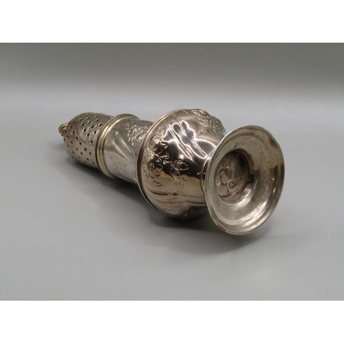 146 - A George III silver pepper with a pierced dome cover and flame finial, having an embossed and chased... 