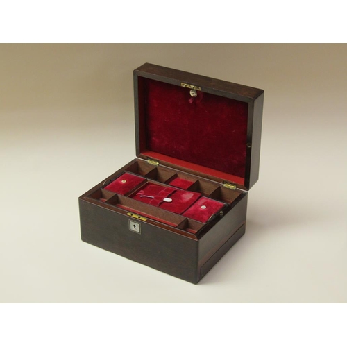 68 - A 19c rosewood ladies vanity box with fitted interior, the hinge cover with rectangular mother of pe... 