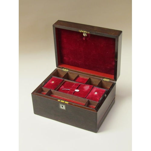 68 - A 19c rosewood ladies vanity box with fitted interior, the hinge cover with rectangular mother of pe... 