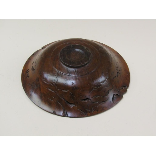 69 - A 19c turned burr wood fruit bowl with a silver chip inlaid border, 32cm diam.