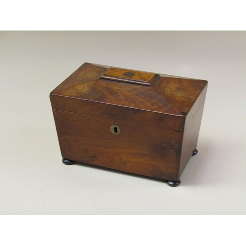 72 - A late Regency mahogany two compartment tea caddy, enclosed by a single hinge cover and supported on... 