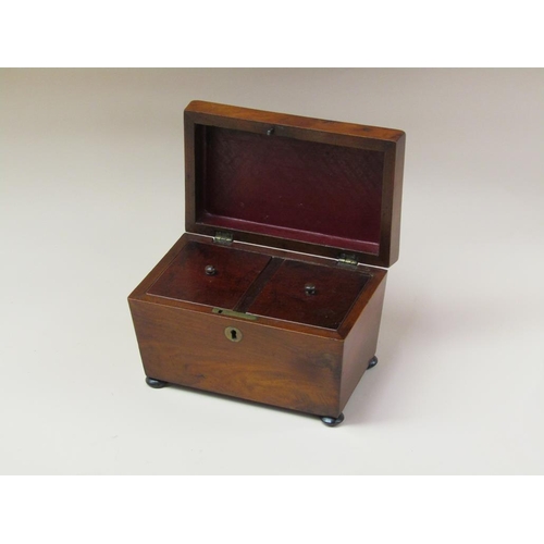 72 - A late Regency mahogany two compartment tea caddy, enclosed by a single hinge cover and supported on... 