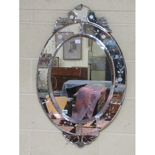 1057 - ENGRAVED OVAL WALL MIRROR, 88CM X 56CM