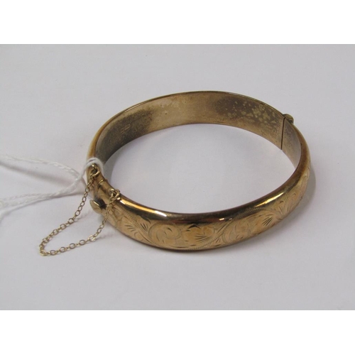 1281 - 9ct GOLD ENGRAVED BANGLE - 15.5g