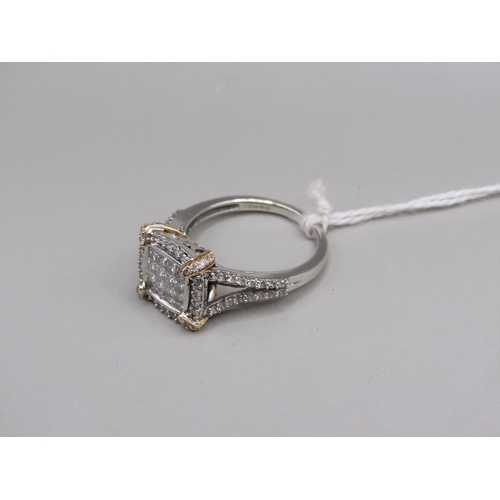 1338A - A LARGE AND IMPRESSIVE 14K WHITE GOLD DIAMOND RING IN A CONTEMPORARY SETTING.  SIZE N 1/2