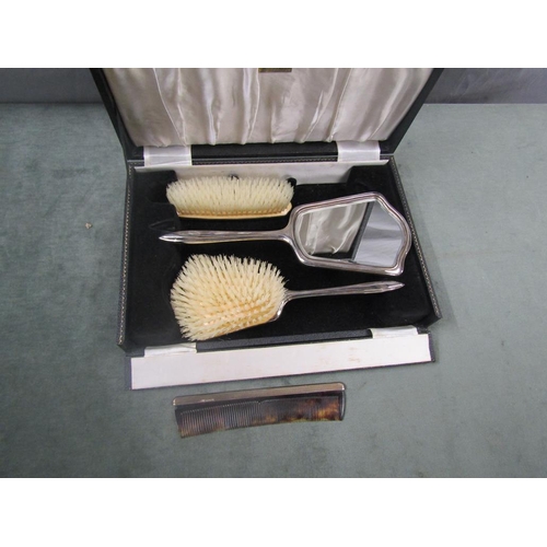 1512 - BOXED SET OF ART DECO PERIOD SILVER DRESSING TABLE MIRROR AND TWO BRUSHES