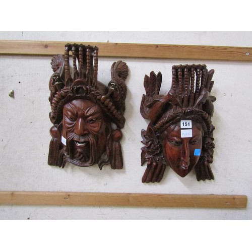 151 - ORIENTAL CARVED MASKS