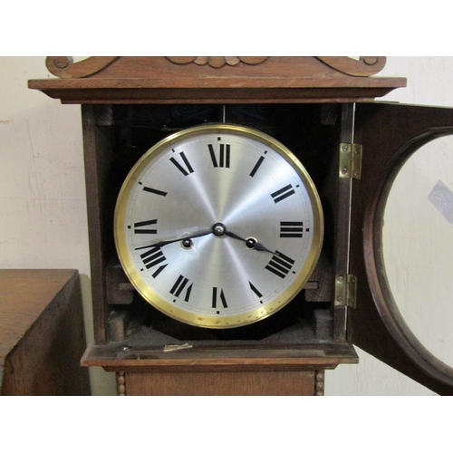 698 - GRANDMOTHER CLOCK - face dia 18.5cms