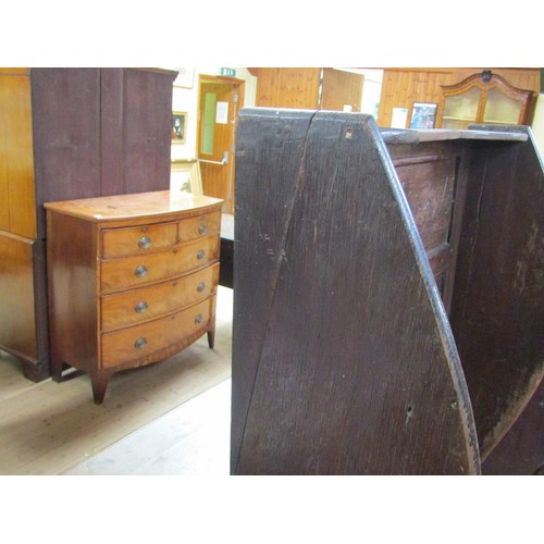 304 - An 18c oak high wingback settle, the top panel carved 'Rest awhile', 83.5cm w, 160cm h.