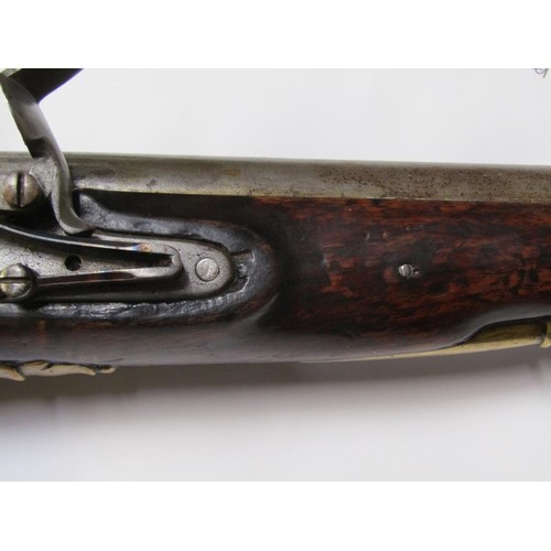 17 - An early 19c flintlock pistol, c.1820, with tower proofs and stamped with crowned GR and Tower, 9in ... 