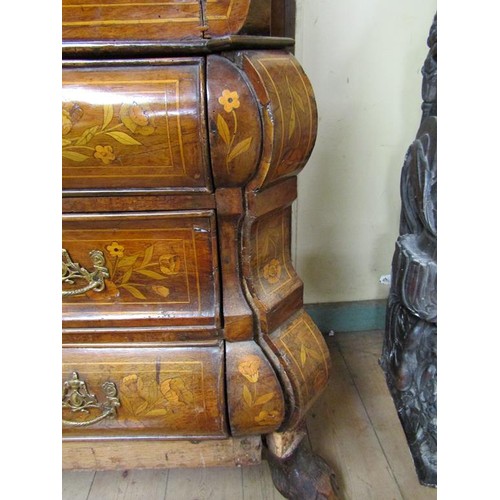 284 - An 18c Dutch style marquetry bureau bookcase, profusely decorated with leaf and flowers, having one ... 