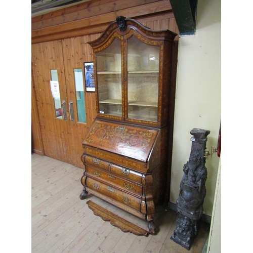 284 - An 18c Dutch style marquetry bureau bookcase, profusely decorated with leaf and flowers, having one ... 