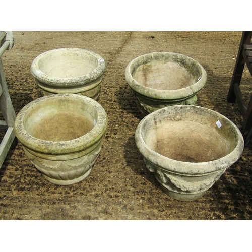 974 - FOUR CONCRETE GARDEN POTS