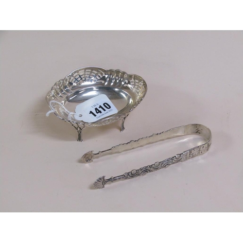 1410 - SILVER PIERCED DISH AND A PAIR OF SILVER TONGS