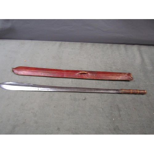 1250 - AFRICAN STEEL BLADED SWORD WITH LEATHER SCABBARD AND HANDLE