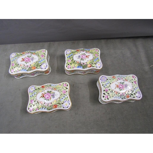 1559 - SET OF FOUR DRESDEN HAND PAINTED BOXES AND COVERS, COVERS WITH RETICULATED, BOXES 17CM W