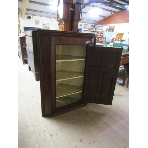 1674 - LATE GEORGIAN OAK CORNER CUPBOARD ENCLOSED BY FOUR PANEL DOOR, 81CM W, 106CMH