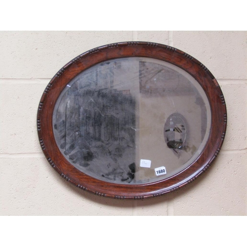 1680 - EARLY 20C OAK FRAMED OVAL WALL MIRROR, 59CM W