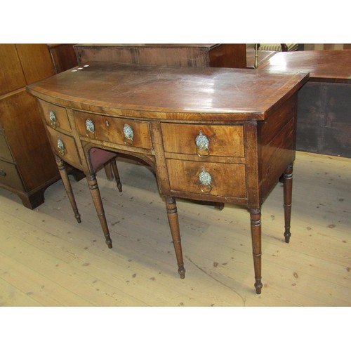 1698 - EARLY 19C MAHOGANY BOW FRONT SIDEBOARD CROSSBANDED AND LINE INLAID HAVING ONE CENTRAL DRAWER OF KNEE... 