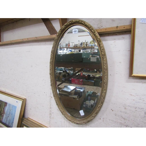 182 - GILT OVAL BEVEL EDGE WALL MIRROR