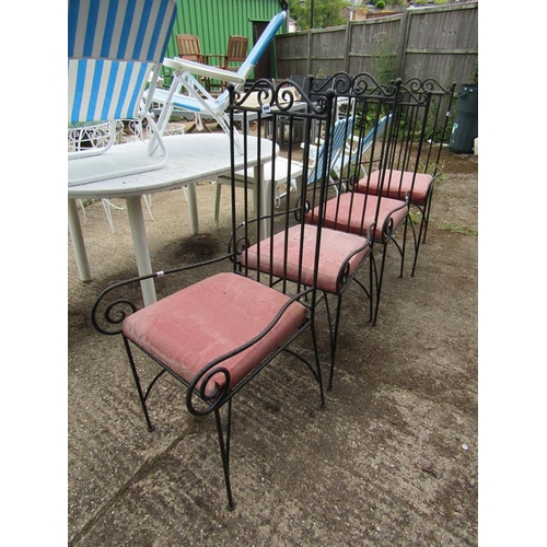 990 - FOUR METAL GARDEN CHAIRS