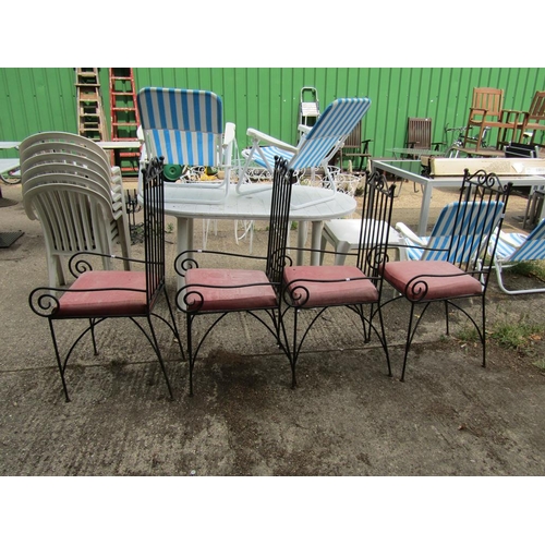 990 - FOUR METAL GARDEN CHAIRS