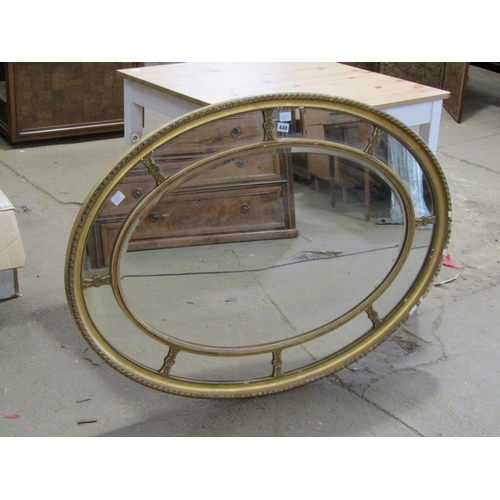 648 - LARGE OVAL MIRROR