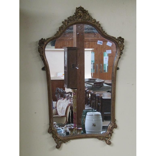 1164 - GILTWOOD AND STUCCO WALL MIRROR OF SERPENTINE FORM, 90CM X 56CM