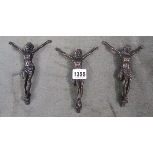 1355 - THREE BRONZED METAL CRUCIFIX'S 16CM H