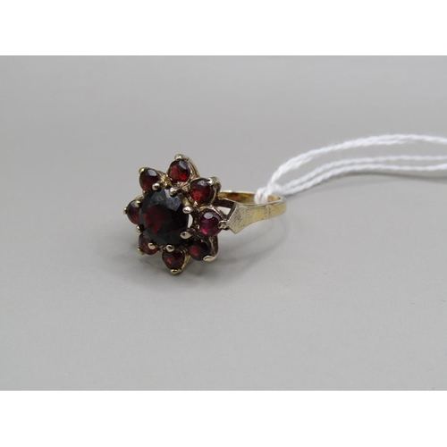 1491 - VINTAGE SILVER GILT GARNET CLUSTER RING SIZE O