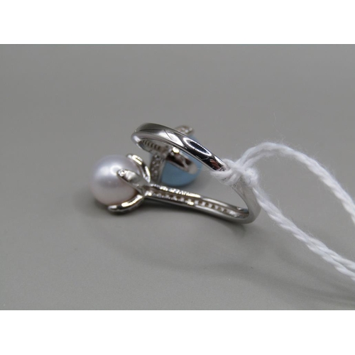 1492 - SILVER AQUAMARINE AND PEARL TWIST RING