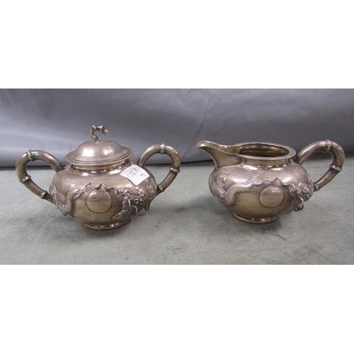 1590 - ORIENTAL SILVER TWO HANDLED SUCRIER TOGETHER WITH A CREAM JUG 70oz