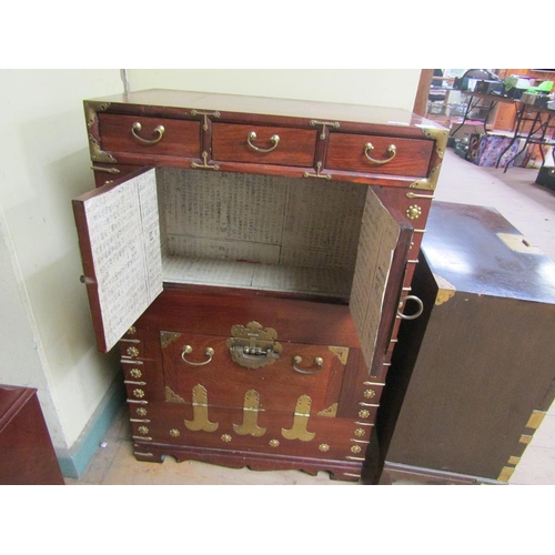 1829 - ORIENTAL HARDWOOD BRASS MOUNTED CUPBOARD FITTED THREE SHORT DRAWERS AND TWO SHELF CUBPOARDS 59 x 88 ... 